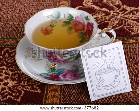 Tea packet and tea cup