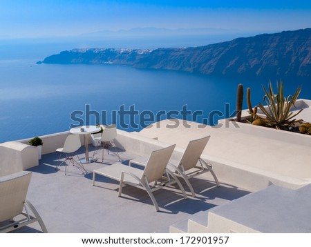 Nice view on blue and  white  hotels and houses of greek island, Santorini, Greece.