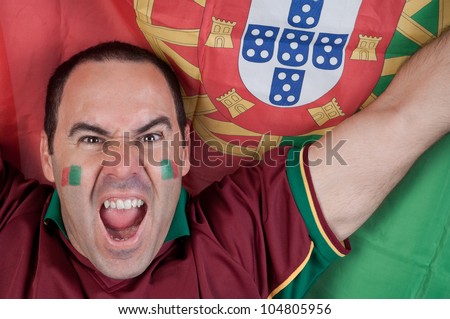 Portugal soccer fan with the portuguese flag