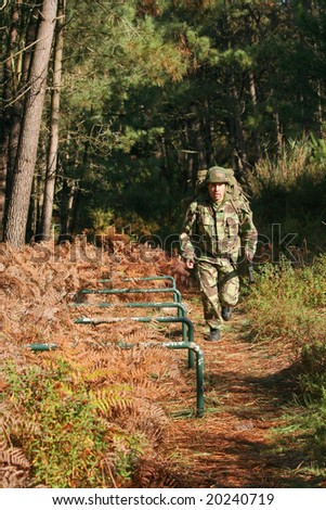 Military physical training, running/march with weapon and backpack