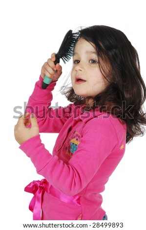 Little cute girl brush the hair isolated on white background