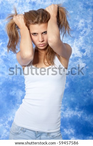 female model posing pushing hair with hands