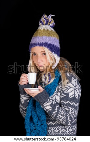 beautiful woman having cup of coffee isolated on black background