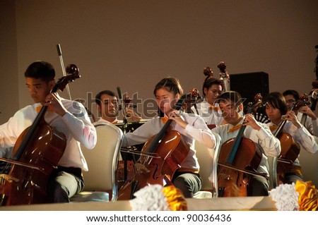 YALA, THAILAND - DECEMBER 2: Unidentified musicians perform for Yala Orchestra Concert in Orchestra Concert for King on Dec 2, 2011 at Meeting Hall Rajabhat University Yala, Thailand