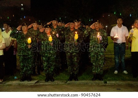 YALA, THAILAND - DECEMBER 5: Unidentified thai soldiers light candles for Candles Loyal for the H.M.K. Bhumibol Adulyadej Birthday on Dec 5, 2011 at Yala Youth Center, Thailand