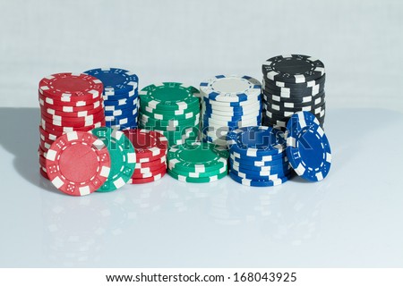 Red, blue, green, black and white Playing Poker Chips
