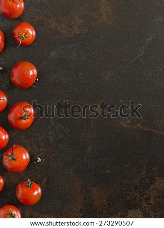 Tomatoes Against Rustic Background. Selective Focus. Shallow Depth of Field. Space for Text.