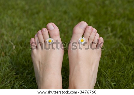 Summer feet with a flower