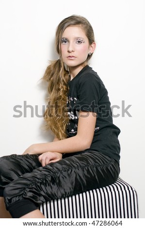 Black and white clothes fashion teenage girl with special eye makeup lashes