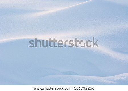 White drifting snow covers the ground following a blizzard near Churchill, Manitoba