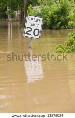 Flood waters overtake a road in rural Indiana