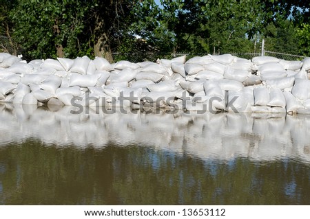 Sand bags help keep flood waters out of a town in Indiana.