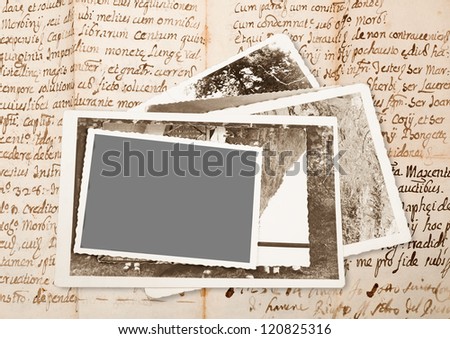 old pictures frame on old manuscript