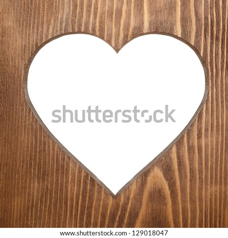 Heart carved in old wood