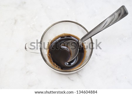 cup of italian coffee chocolate isolated on white marble background