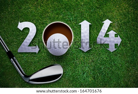 Happy New Golf year 2014 Golf ball and putter on green grass the same concept available for 2015 2016 and 2017 year Happy New Golf year 2014 Golf ball and putter on green grass the same concept available for 2015 2016 and 2017 year