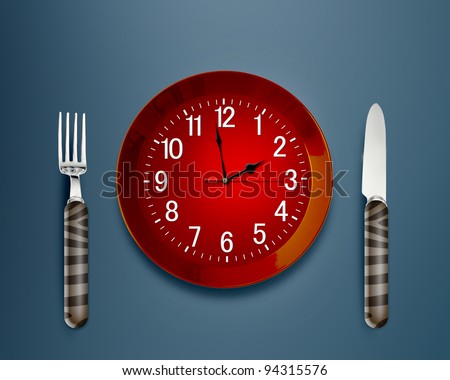 Lunch time concept, Clock in plate, knife and fork
