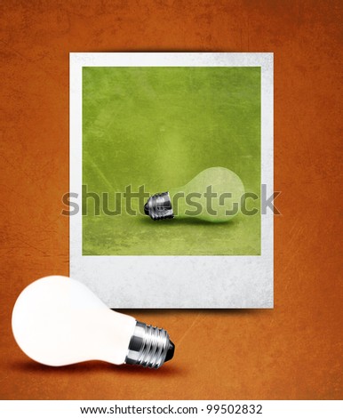 light bulb made in and out of photograph  , light bulb conceptual Image.