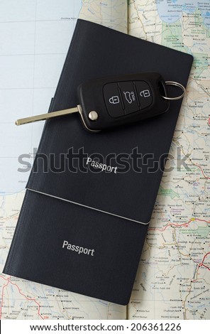 two passports with map and car key