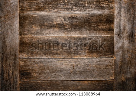 Old and antique wood plank board grunge background made of aged and weathered vintage barn wood with worn grain and texture
