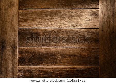 Old antique wood board plank grunge background built with aged and weathered vintage barn wood featuring worn grain and texture