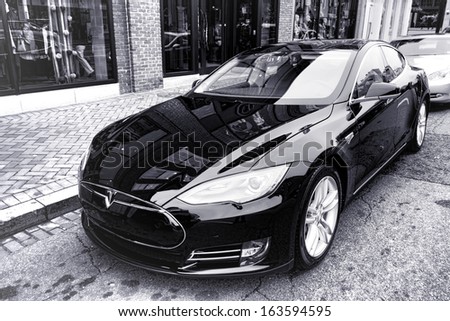 WASHINGTON, DC - November 2013: Tesla Motors model S sedan electric car is parked while NHTSA investigates fire incident with this advanced battery powered automobile on November 2013 in Washington DC