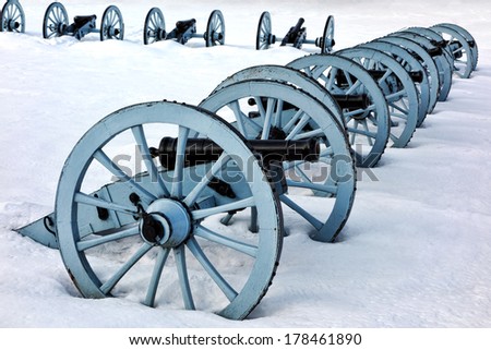 American Revolutionary War cannons defense battery artillery formation in winter snow at Valley Forge National Historical Park military camp of the Continental Army near Philadelphia in Pennsylvania