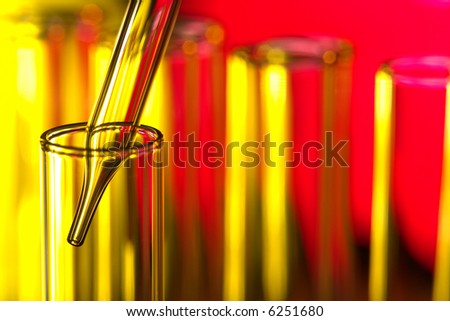 Laboratory pipette inside a glass test tube for an experiment in a science research lab
