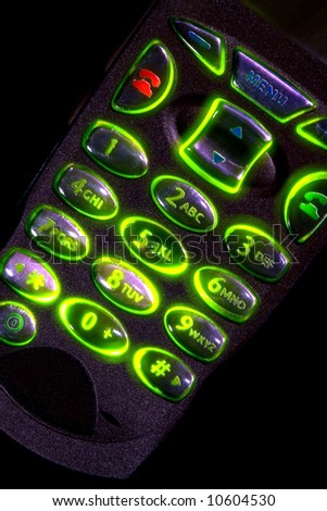 Back lit cell phone key pad with glowing green number keys
