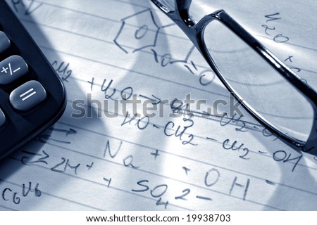 Chemistry formulas on hand written scientist notes with glasses and calculator in a science research lab