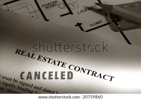 Canceled stamp imprint on a real estate contract over house floor plan