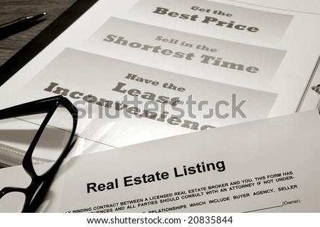 Real estate listing contract over professional realtor agent marketing and advertising presentation binder with house sale strategy slogans (fictitious document with authentic legal language)