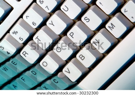The word oops spelled with modified keys on a special computer keyboard partially submerged in water