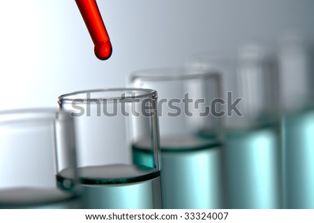 Laboratory pipette with drop of red liquid over glass test tubes filled with green chemicals for an experiment in a science research lab