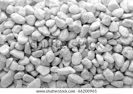 Small naturally polished  white rock pebbles background