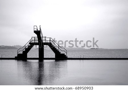 Concrete stairs diving board at the public tide pool by the sea in Saint Malo France