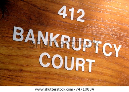Bankruptcy court sign outside an insolvency case resolution and judgment chamber in a courthouse