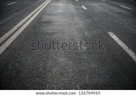 Asphalt Road With White Stripes