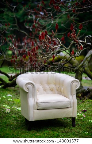 White sofa in the garden