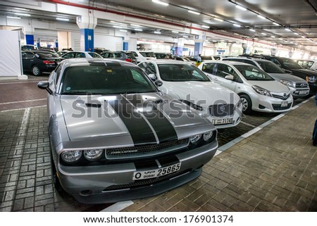 DUBAI, UAE - FEBRUARY 10: Underground parking with cars on February 10, 2014 in Dubai. Parking at mall of the Emirates is a shopping mall in the Al Barsha district of Dubai.