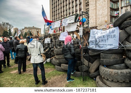 DONETSK, UKRAINE - 14 APRIL 2014: Russian demonstrators protesting and blockade of donetsk goverment during Ukrainian revolution on APRIL 14, 2014 in Donetsk, Ukraine.