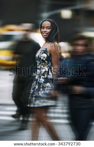 Beautiful african american woman walking on New York City street