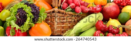 composition of fruits and vegetables in basket on white