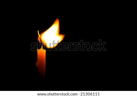 candle isolated on a black background