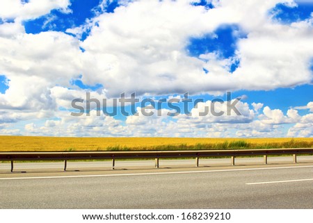 The road above the clouds, in Sunny warm summer weather between settlements.