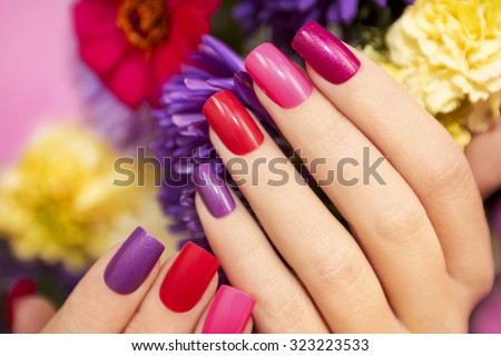 Manicure covered with nail Polish in the colors of nature. shallow dof