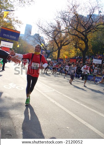 Runners are elated as they approach the finish line of the 2006 ING New York City Marathon