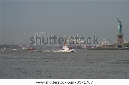 Coast Guard boat and fire tug in New York Harbor on May 23, 2007 during Fleet Week