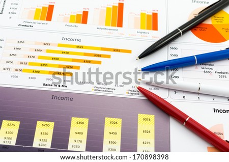 Sales Report in Statistics Graphs and several color pencil\'s
