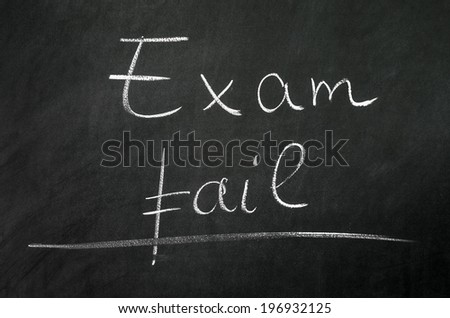 Exam fail writed on blackboard with chalk